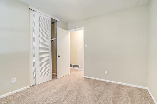 3539 Meadowridge Drive Southwest Atlanta, GA 30331 - Photo 23 of 25 an empty room with closet and a bathroom