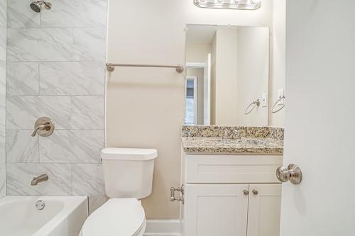 3539 Meadowridge Drive Southwest Atlanta, GA 30331 - Photo 10 of 25 a bathroom with a sink toilet and shower