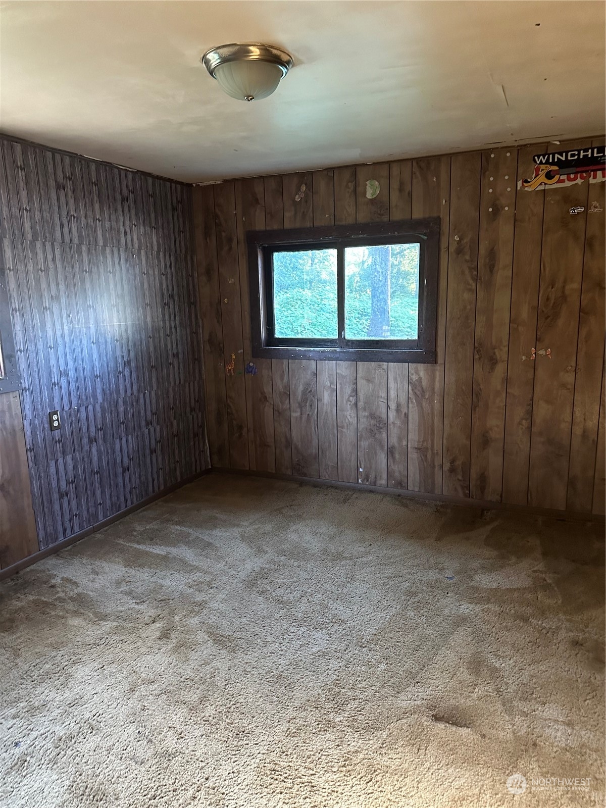 1793 Southeast Crawford Road Port Orchard, WA 98366 - Photo 4 of 8 an empty room with windows