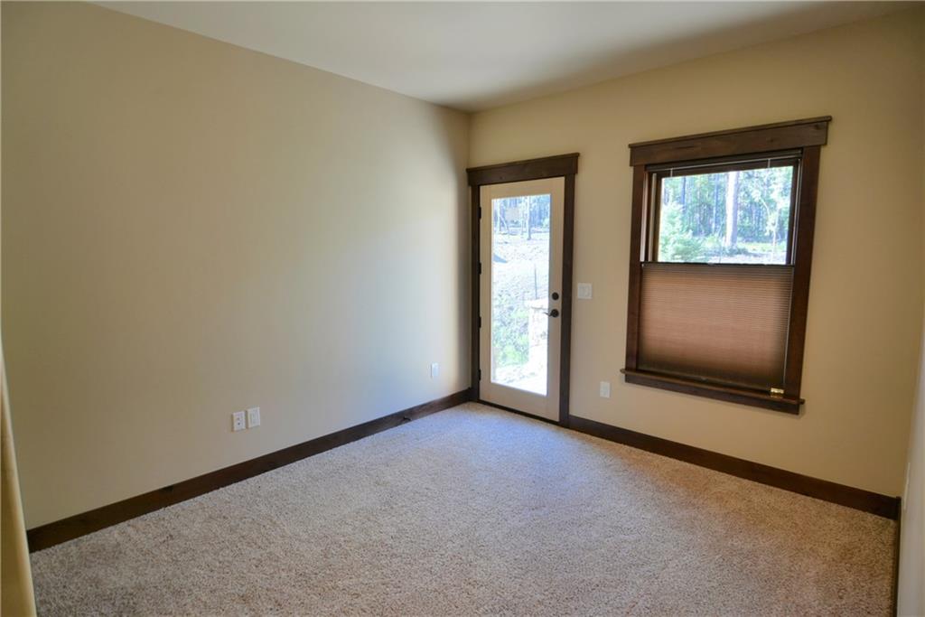 878 Independence Road, Unit 1A Keystone, CO 80435 - Photo 12 of 25 a view of an empty room with a window