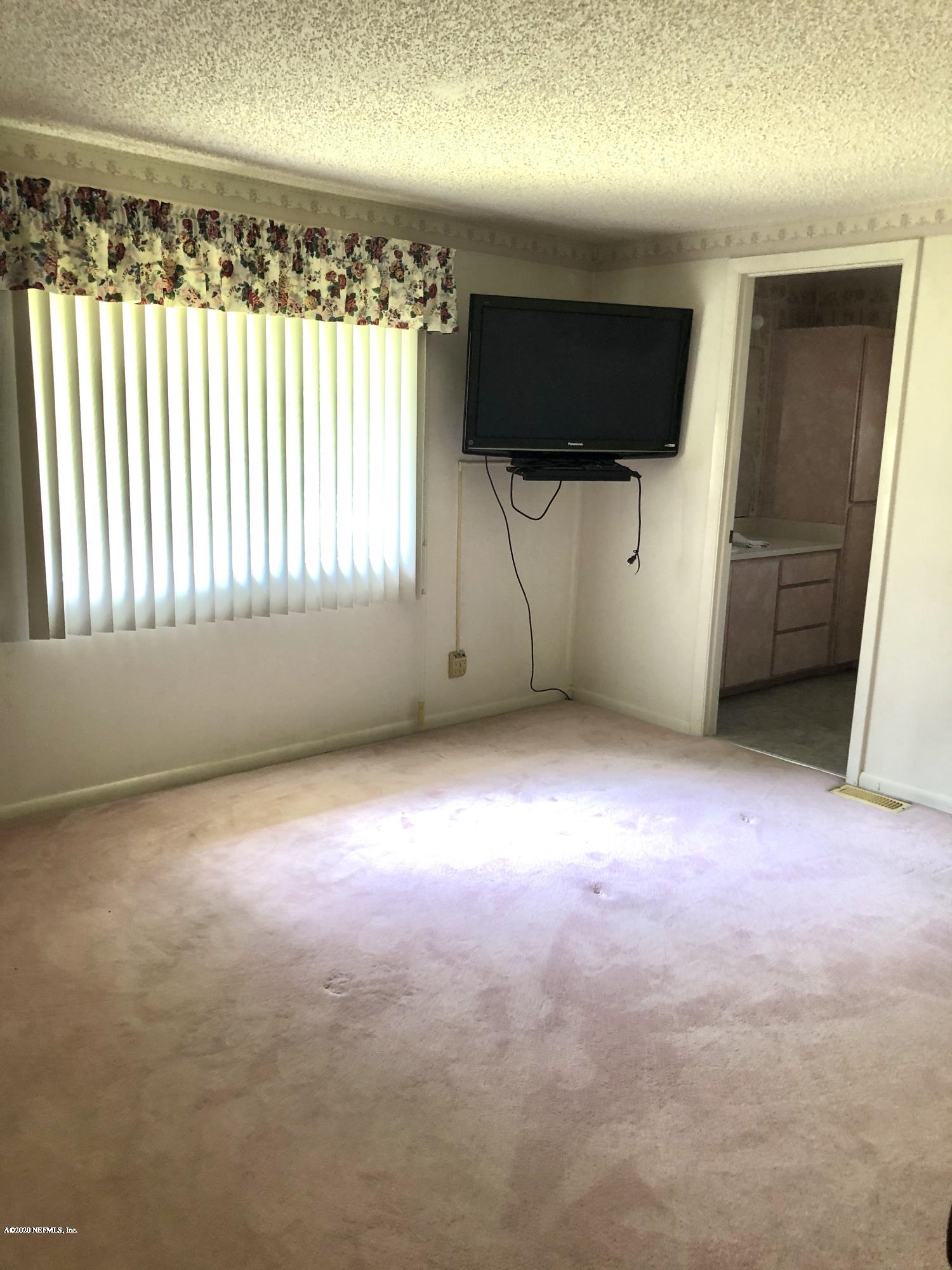 3210 Pacetti Road St. Augustine, FL 32092 - Photo 14 of 17 an empty room with windows