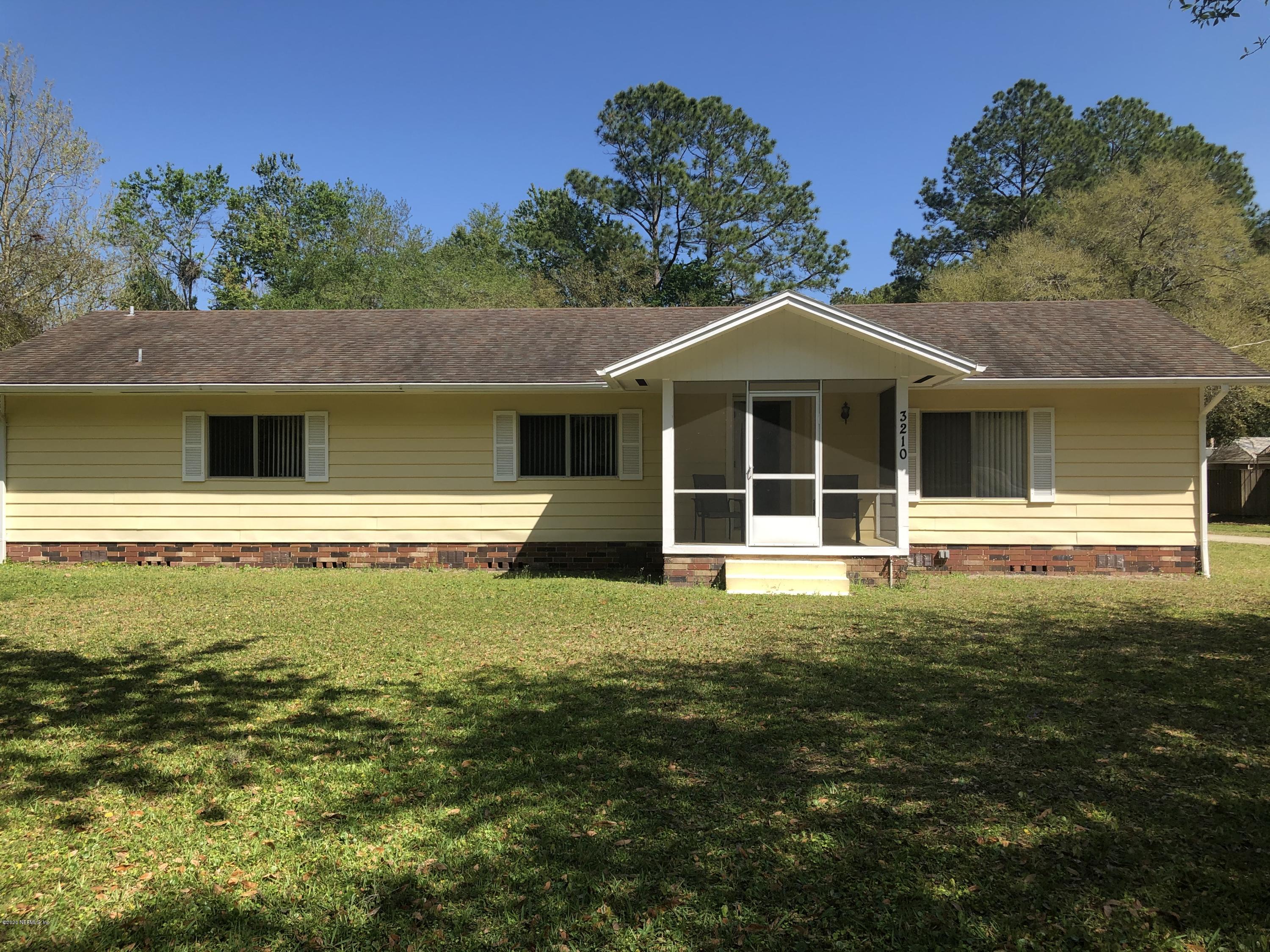 3210 Pacetti Road St. Augustine, FL 32092 - Photo 2 of 17 a house view with a garden space