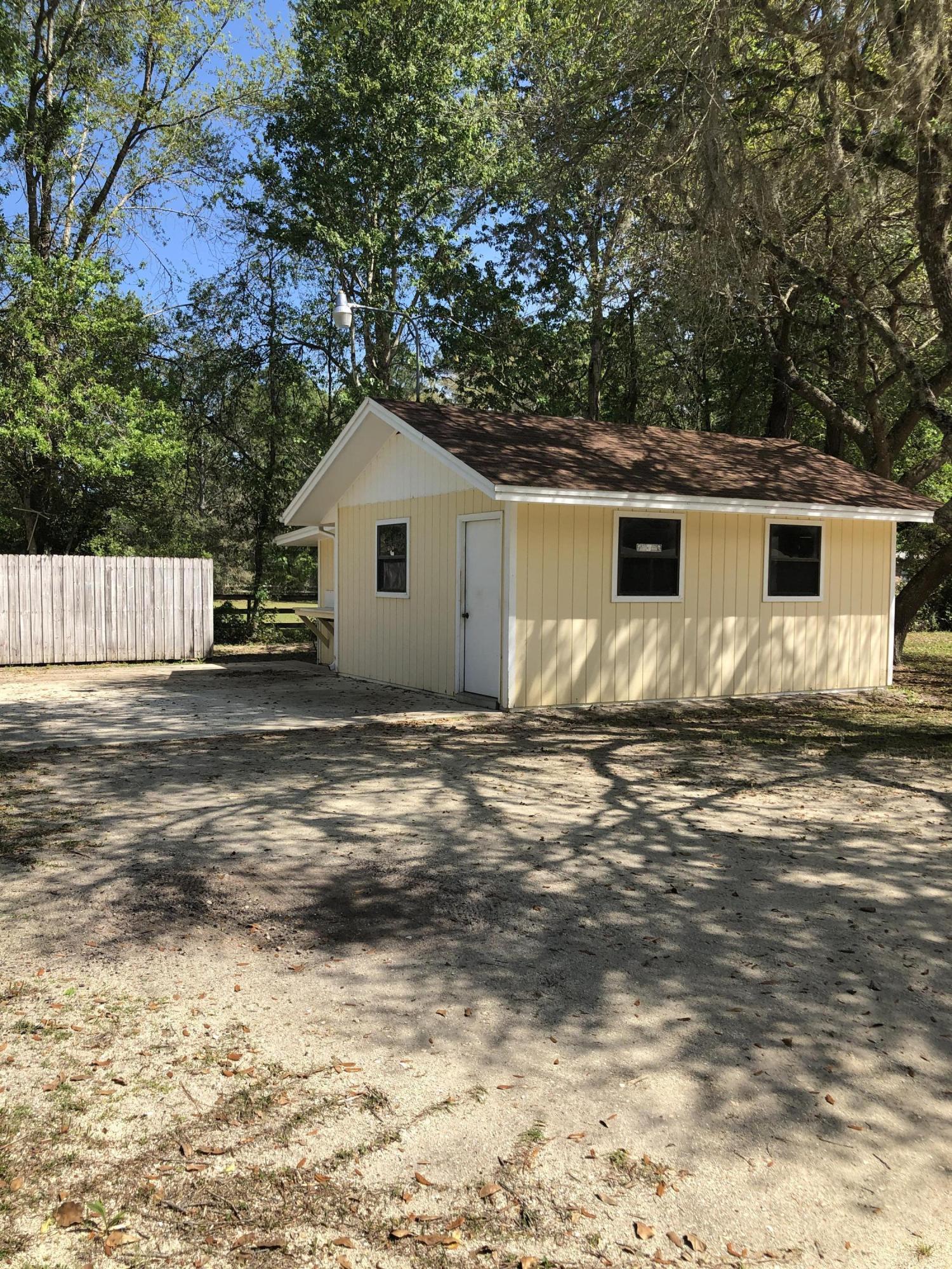 3210 Pacetti Road St. Augustine, FL 32092 - Photo 4 of 17 a view of a house with a yard