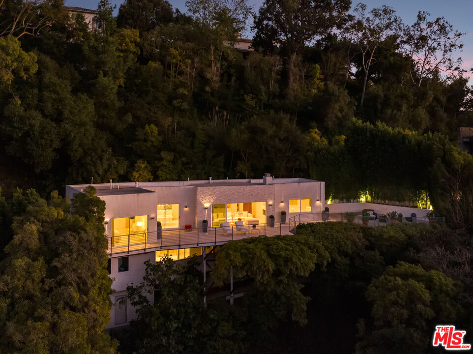 9422 Readcrest Drive Beverly Hills, CA 90210 - Photo 1 of 34 a view of a back yard of the house and green space
