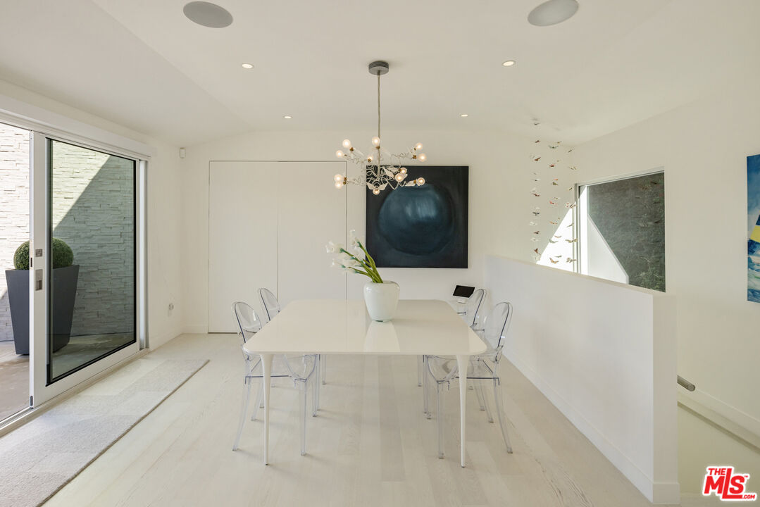 9422 Readcrest Drive Beverly Hills, CA 90210 - Photo 14 of 34 a living room with furniture and a flat screen tv