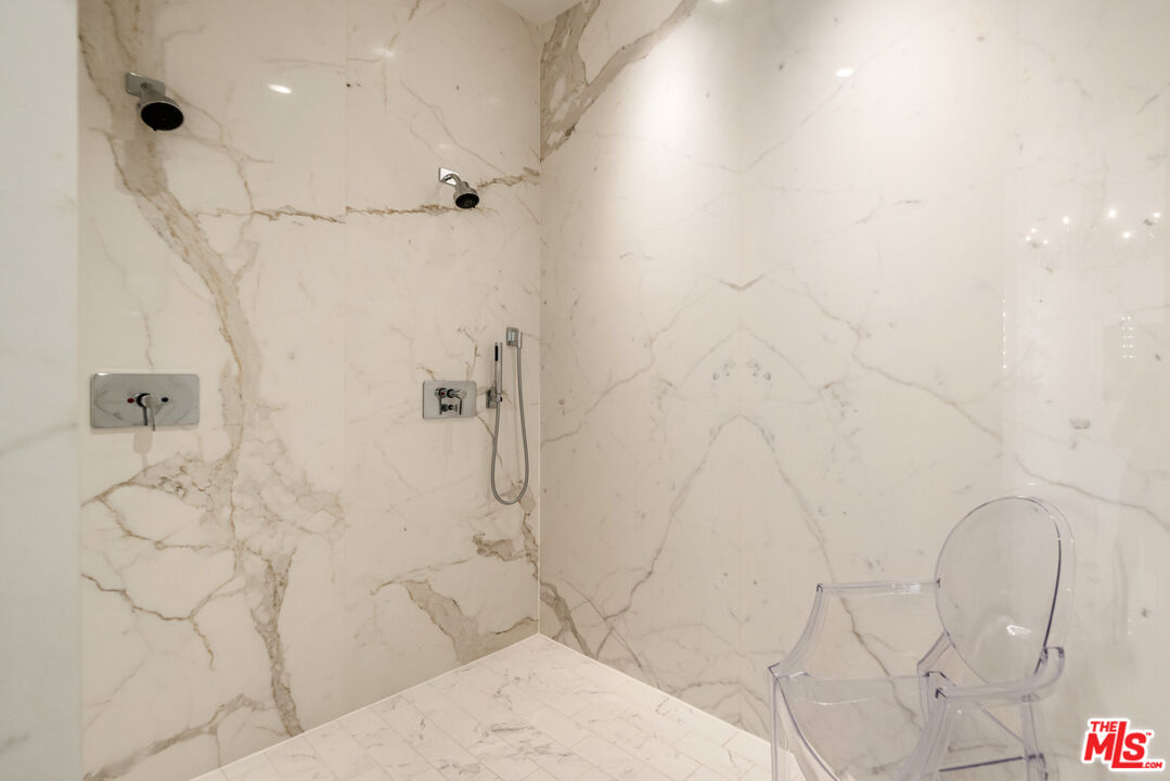 9422 Readcrest Drive Beverly Hills, CA 90210 - Photo 19 of 34 a bathroom with a shower