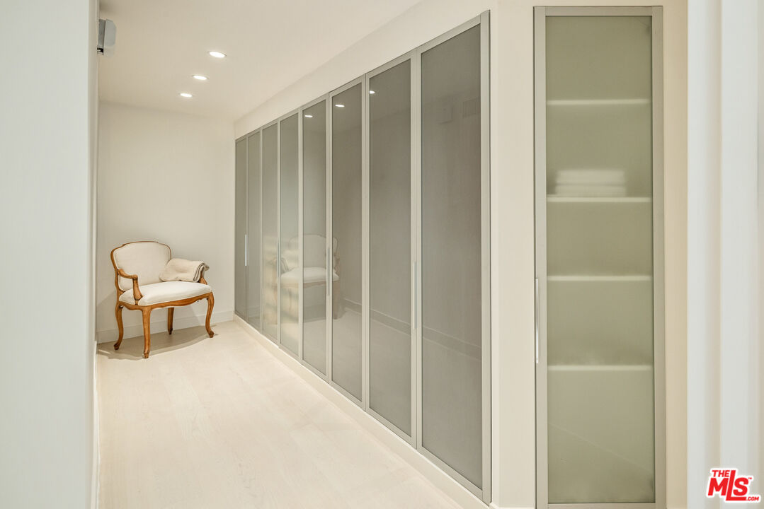 9422 Readcrest Drive Beverly Hills, CA 90210 - Photo 27 of 34 a bathroom with a sink and a mirror