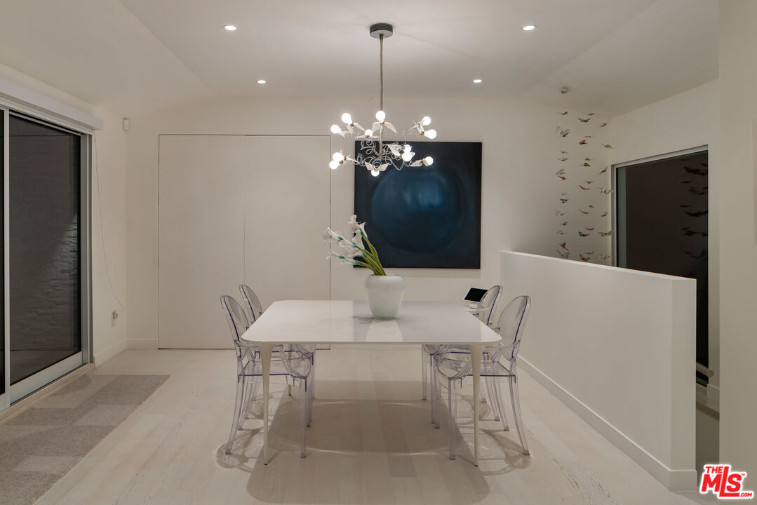 9422 Readcrest Drive Beverly Hills, CA 90210 - Photo 33 of 34 a dining room with furniture and chandelier kitchen view