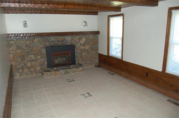 218 County Road Freetown, MA 02717 - Photo 12 of 30 a living room with a fireplace