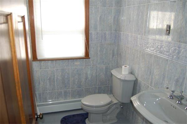 218 County Road Freetown, MA 02717 - Photo 15 of 30 a bathroom with a sink toilet and shower
