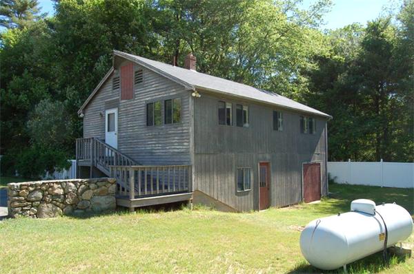 218 County Road Freetown, MA 02717 - Photo 22 of 30 a view of backyard with small cabin and wooden fence
