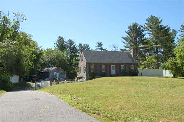 218 County Road Freetown, MA 02717 - Photo 30 of 30 a front view of house with yard and trees in the background