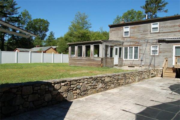 218 County Road Freetown, MA 02717 - Photo 5 of 30 a front view of a house with a garden