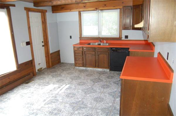 218 County Road Freetown, MA 02717 - Photo 9 of 30 a kitchen with stainless steel appliances granite countertop a sink stove and a refrigerator