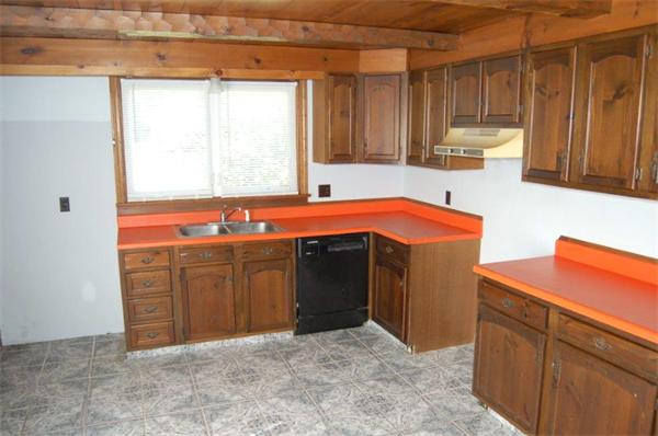 218 County Road Freetown, MA 02717 - Photo 10 of 30 a kitchen with stainless steel appliances granite countertop a sink and a refrigerator