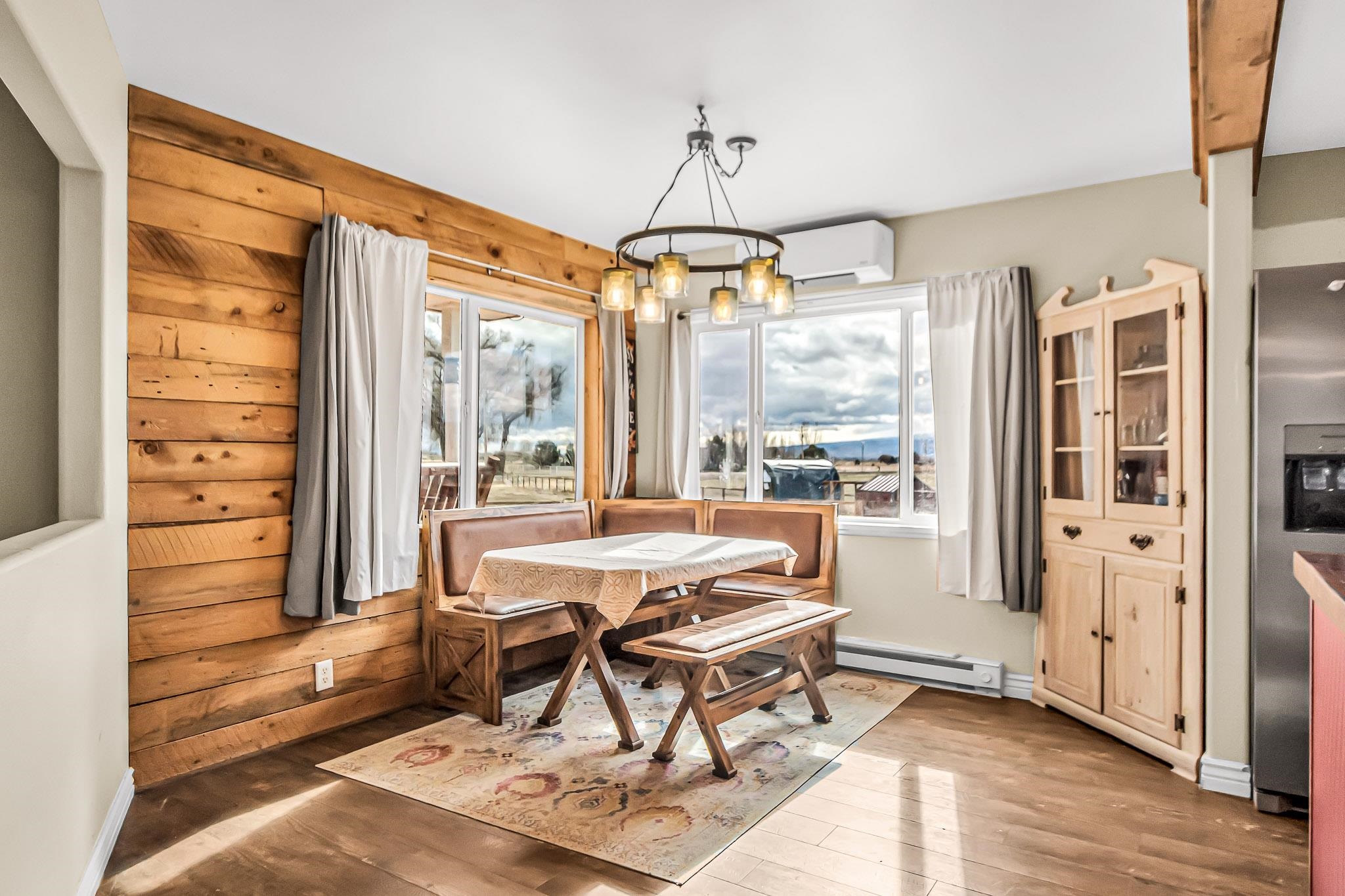 1473 19 Road Fruita, CO 81521 - Photo 11 of 41 a dining room with furniture and window