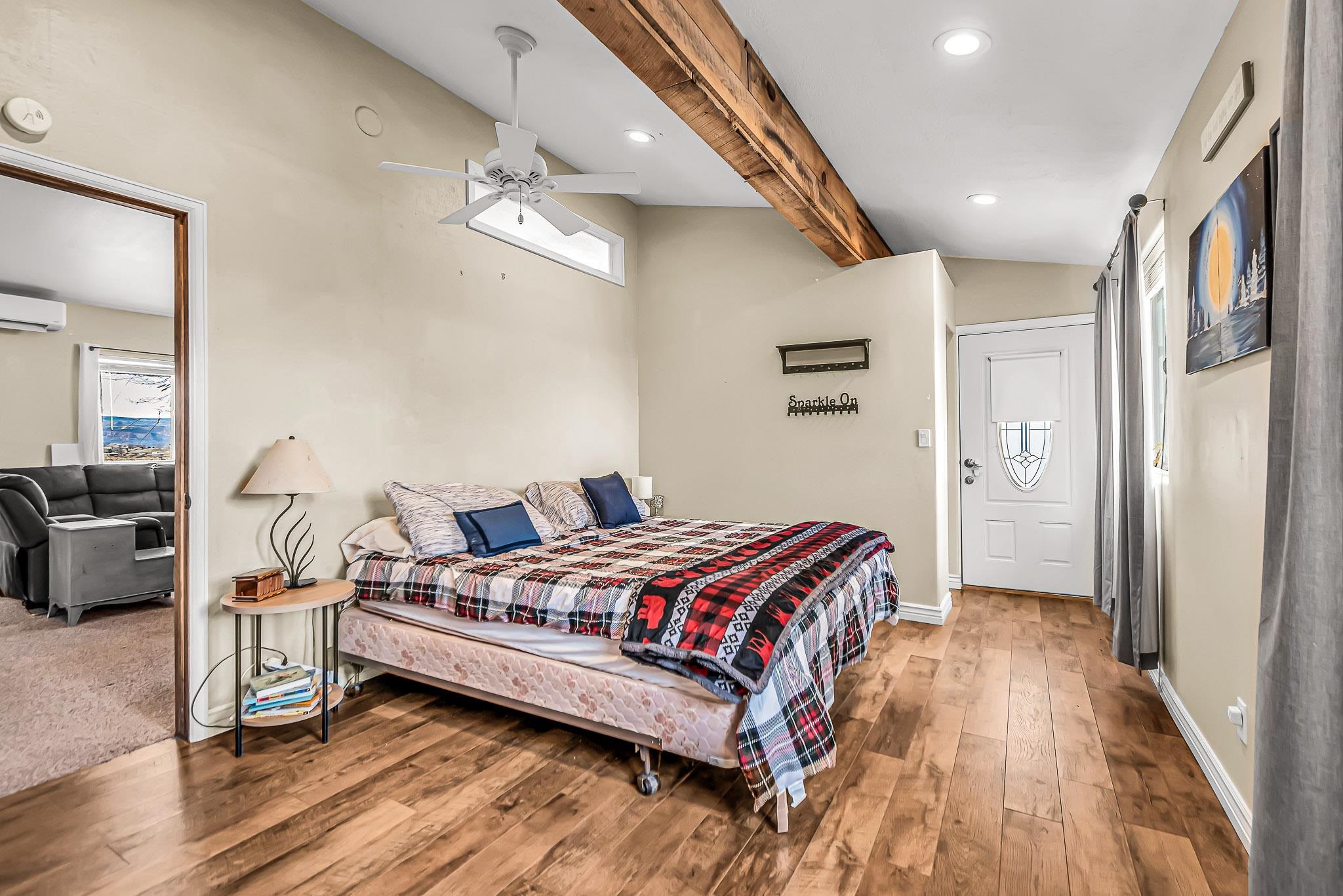1473 19 Road Fruita, CO 81521 - Photo 15 of 41 a bedroom with a bed and a view of bathroom