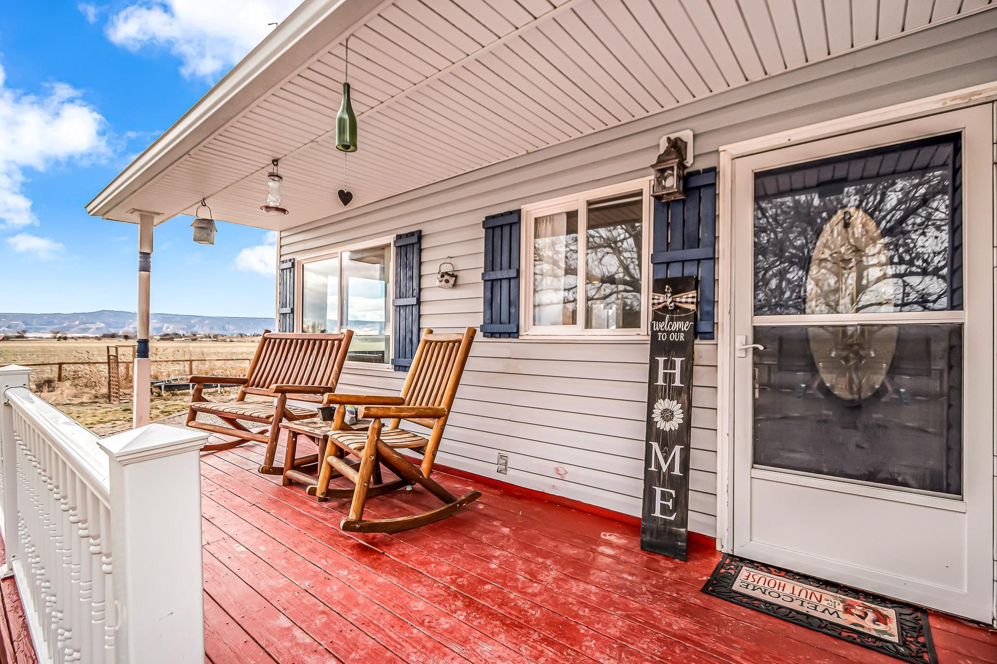 1473 19 Road Fruita, CO 81521 - Photo 2 of 41 a view of a patio with a table and chairs