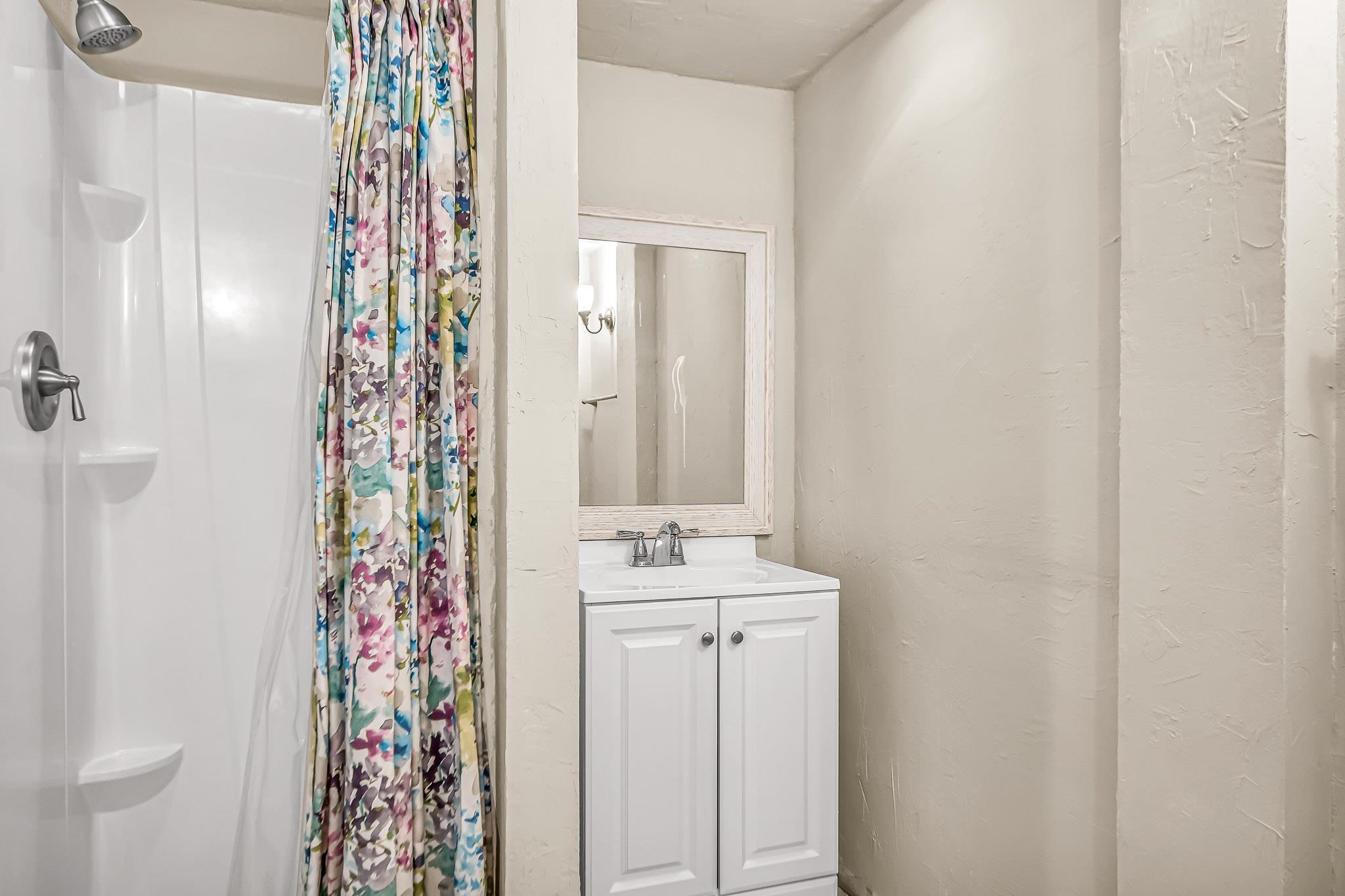 1473 19 Road Fruita, CO 81521 - Photo 24 of 41 a bathroom with a sink and a mirror