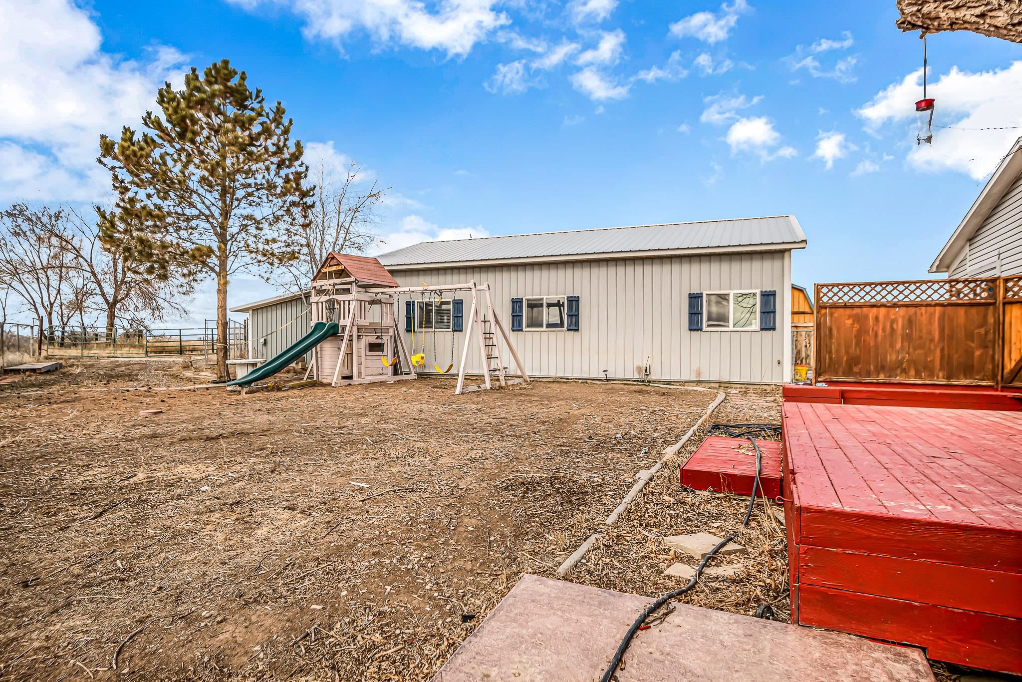 1473 19 Road Fruita, CO 81521 - Photo 30 of 41 a view of a house with backyard