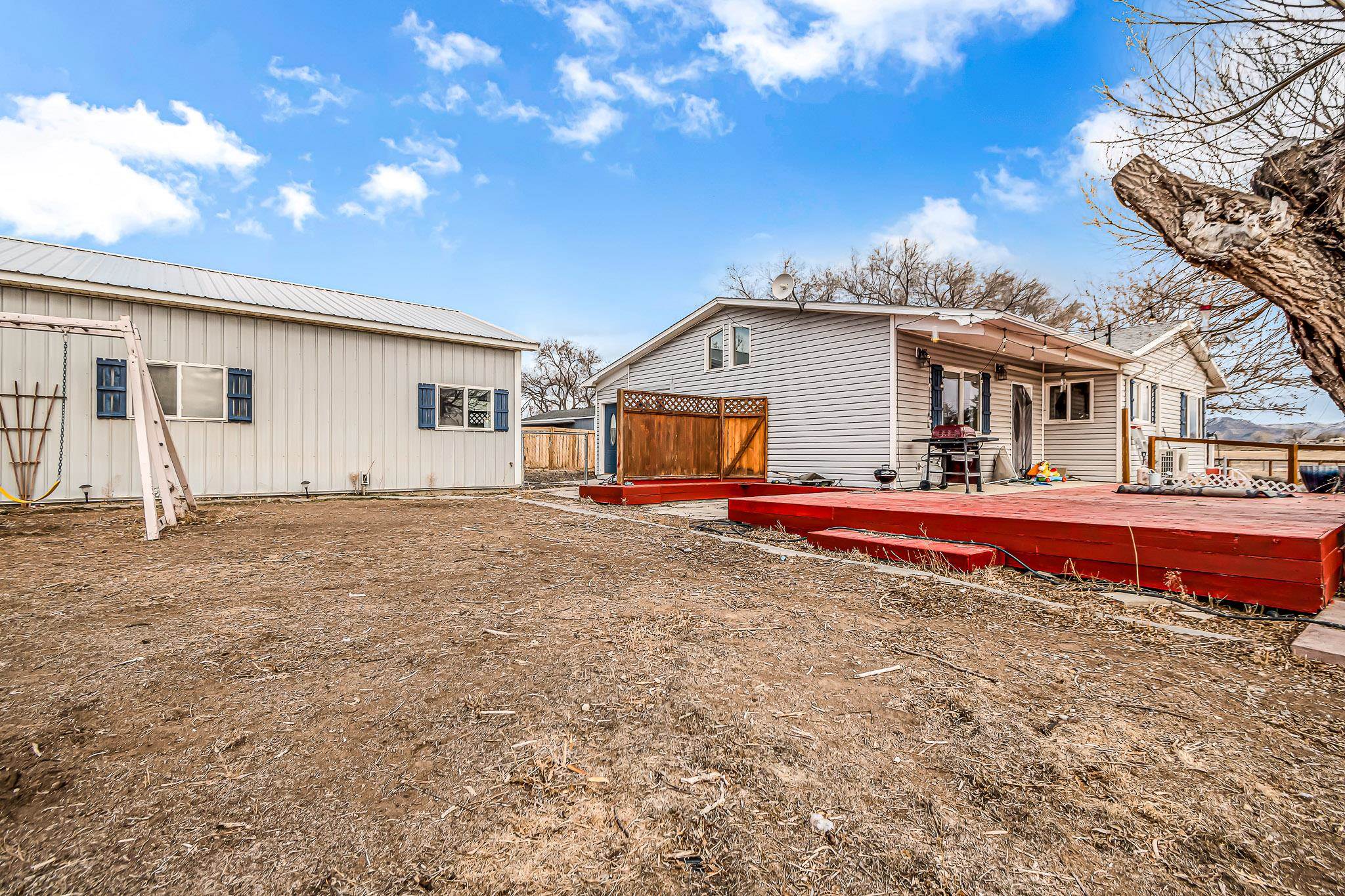 1473 19 Road Fruita, CO 81521 - Photo 31 of 41 a front view of a house with a yard