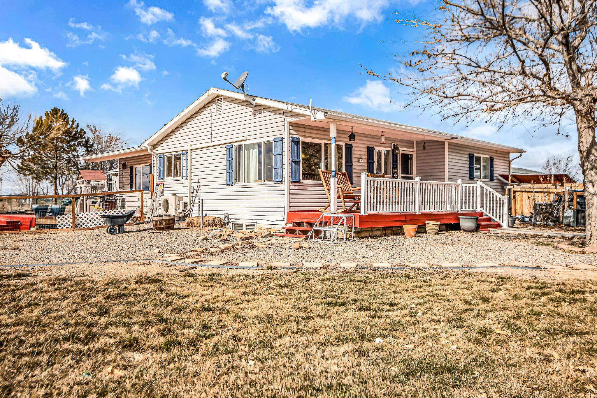 1473 19 Road Fruita, CO 81521 - Photo 37 of 41 a front view of a house with a yard