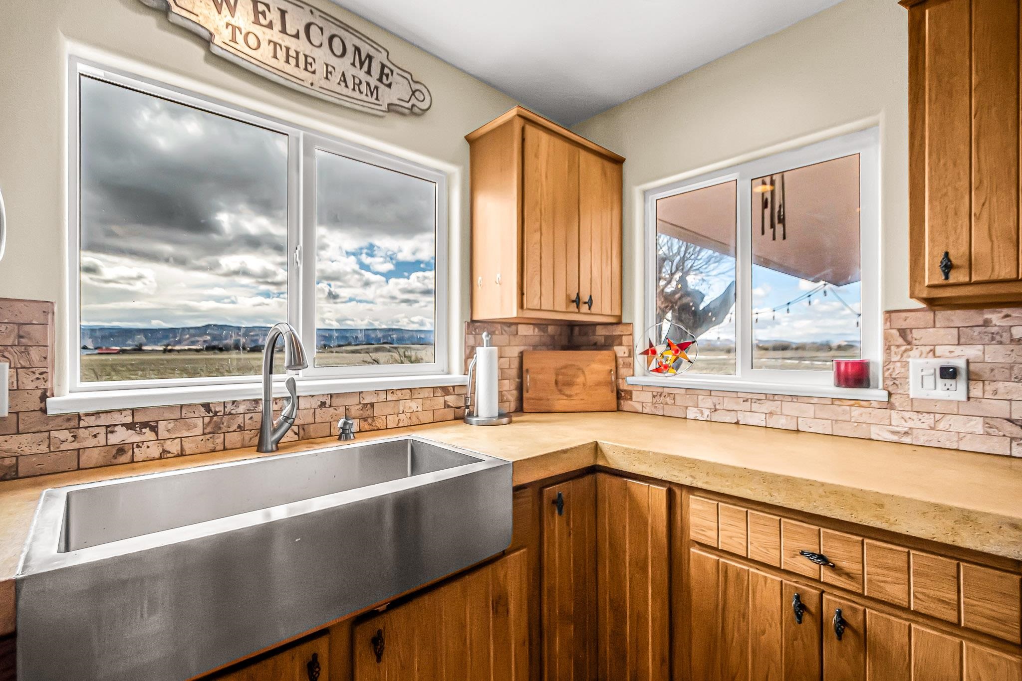 1473 19 Road Fruita, CO 81521 - Photo 9 of 41 a view of a kitchen with a sink and large window