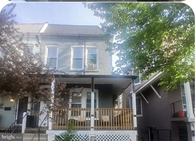 front view of a house with a porch