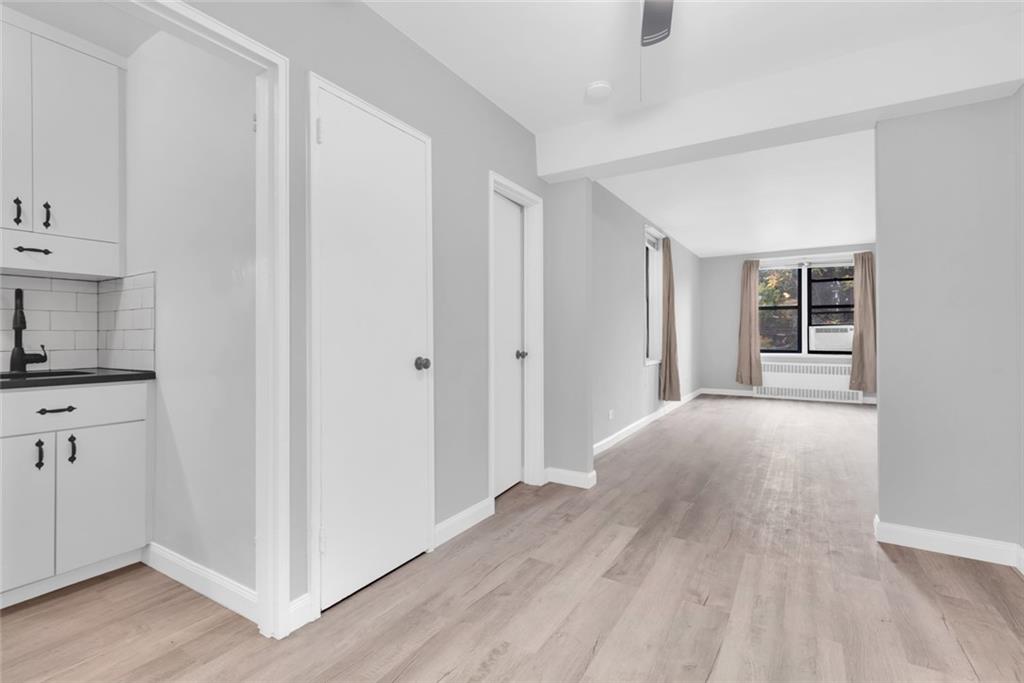 7259 Shore Road, Unit 2H Brooklyn, NY 11209 - Photo 6 of 9 a view of livingroom with hardwood