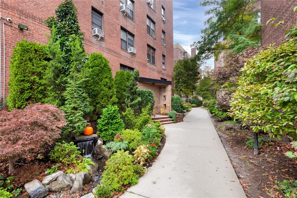 7259 Shore Road, Unit 2H Brooklyn, NY 11209 - Photo 9 of 9 a view of a pathway with a building in the background