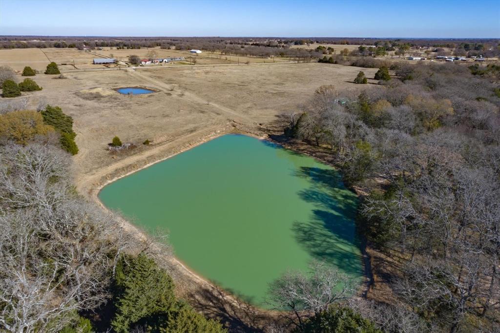 0 Fm Road Scurry, TX 75158 - Photo 3 of 17 a view of a lake with a outdoor space