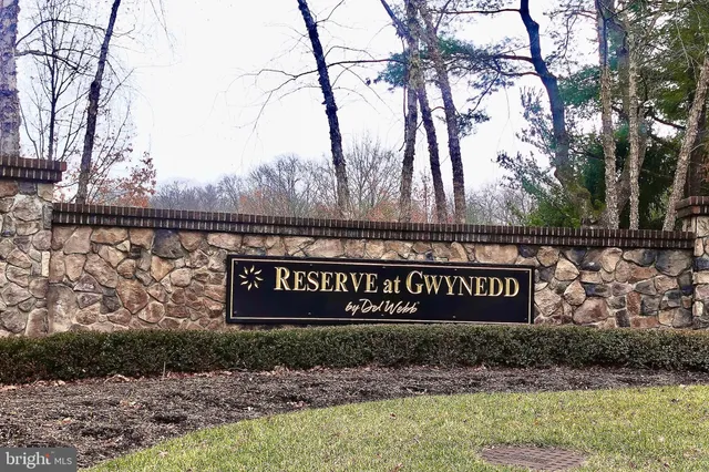a view of outdoor space with signage and flags
