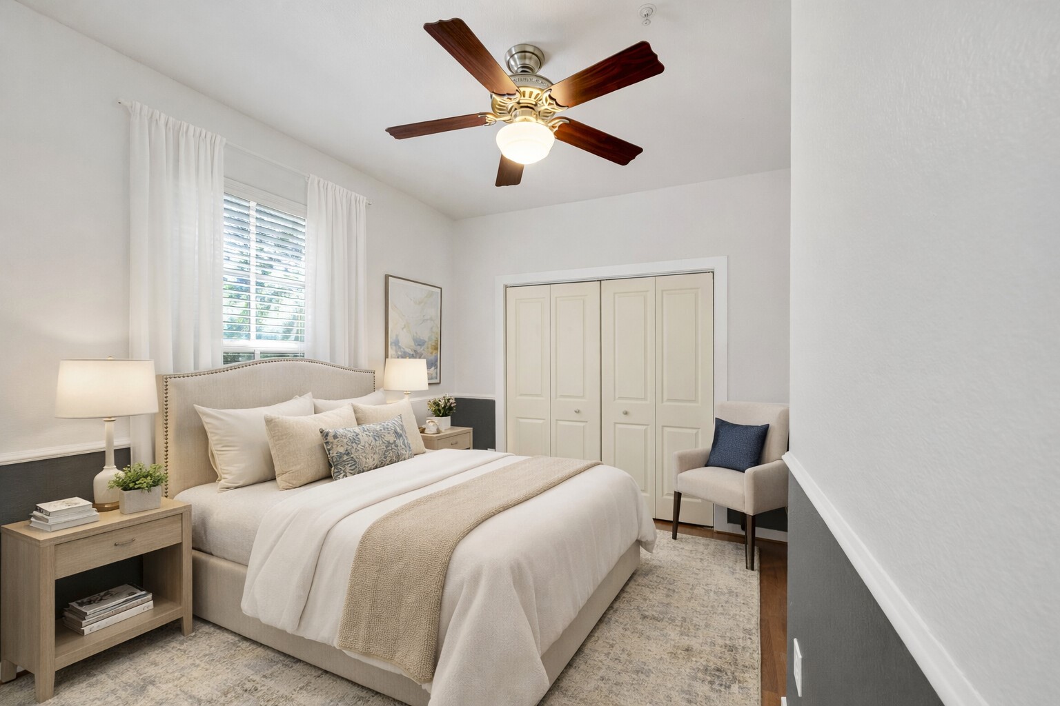 2216 Chenevert Street, Unit 6 Houston, TX 77003 - Photo 13 of 29 Guest Bedroom (Upstairs): Bright and inviting guest bedroom located at the top of the stairs, featuring oversized windows with peaceful views of the quiet, tree-lined street...perfect as a guest suite, home office, or flexible living space. Image is virtually staged.