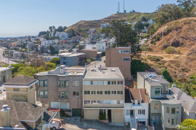 a large building with a clock tower in the middle