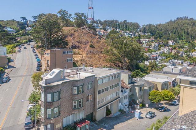 a view of city with tall buildings