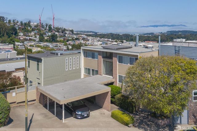 a terrace with a table and chairs