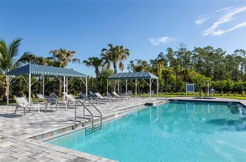 a view of a house with swimming pool