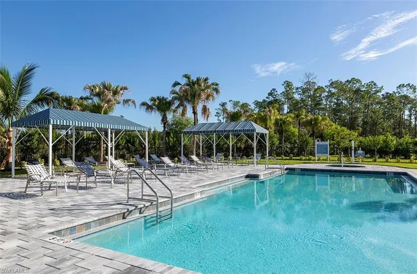 a view of a house with swimming pool
