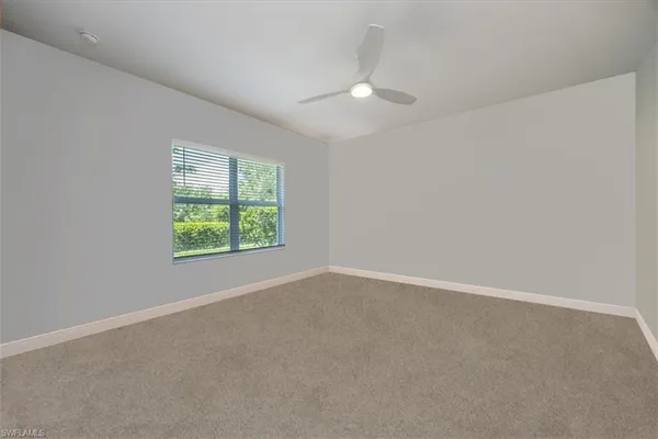 a spacious bathroom with a double vanity sink mirror and double