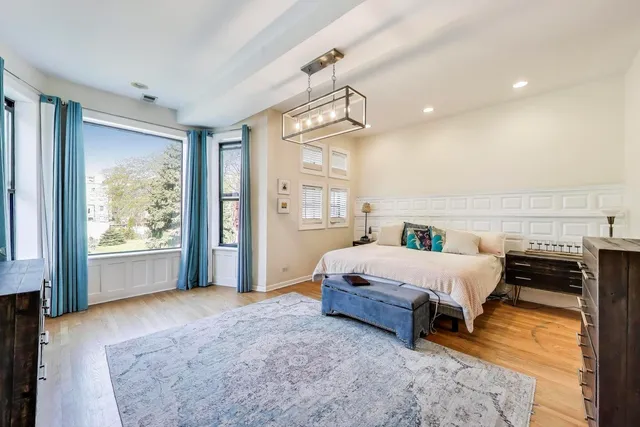 a bathroom with a bathtub and a sink