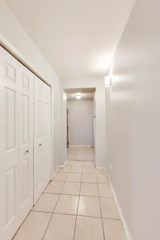 a picture of a bathroom with a sink and mirror