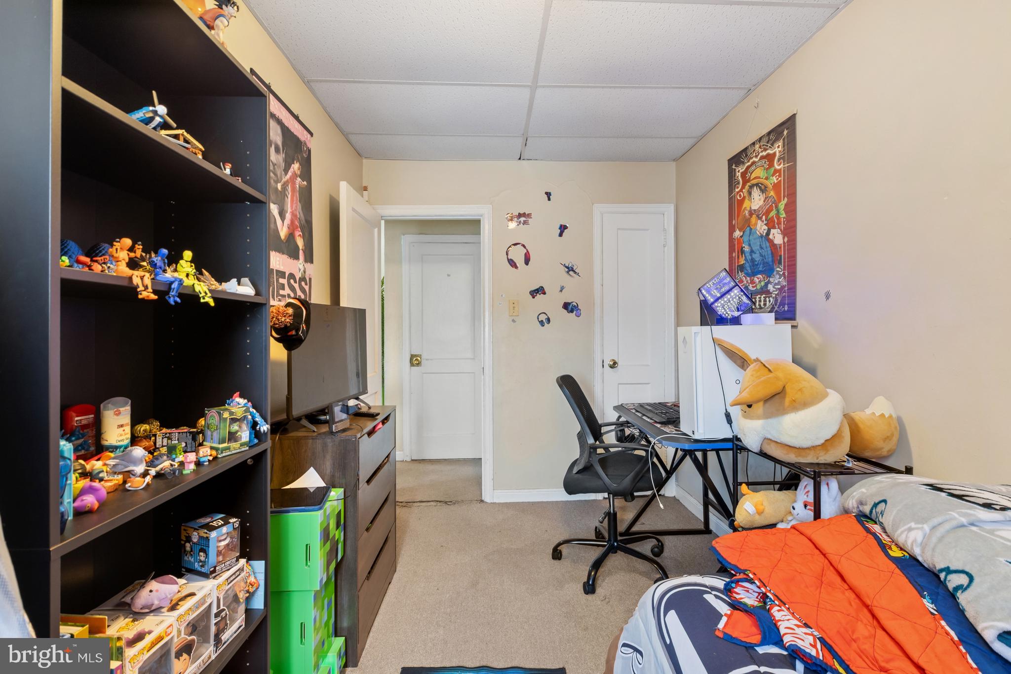 6136 Hawthorne Street Philadelphia, PA 19135 - Photo 15 of 38 a view of a workspace with furniture and toys