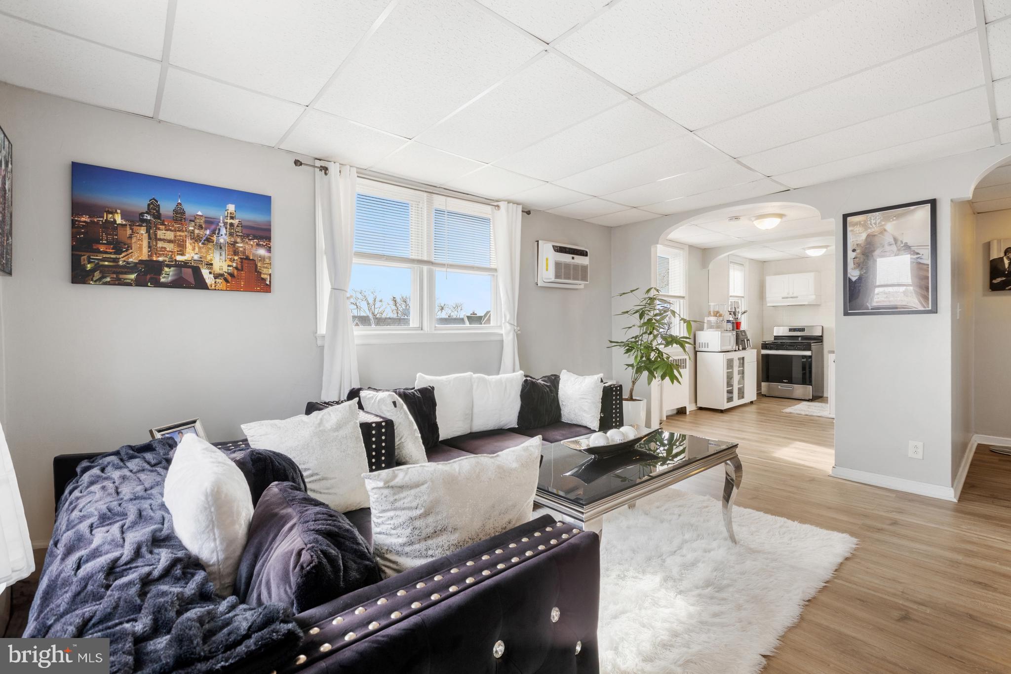 6136 Hawthorne Street Philadelphia, PA 19135 - Photo 17 of 38 a living room with furniture and wooden floor