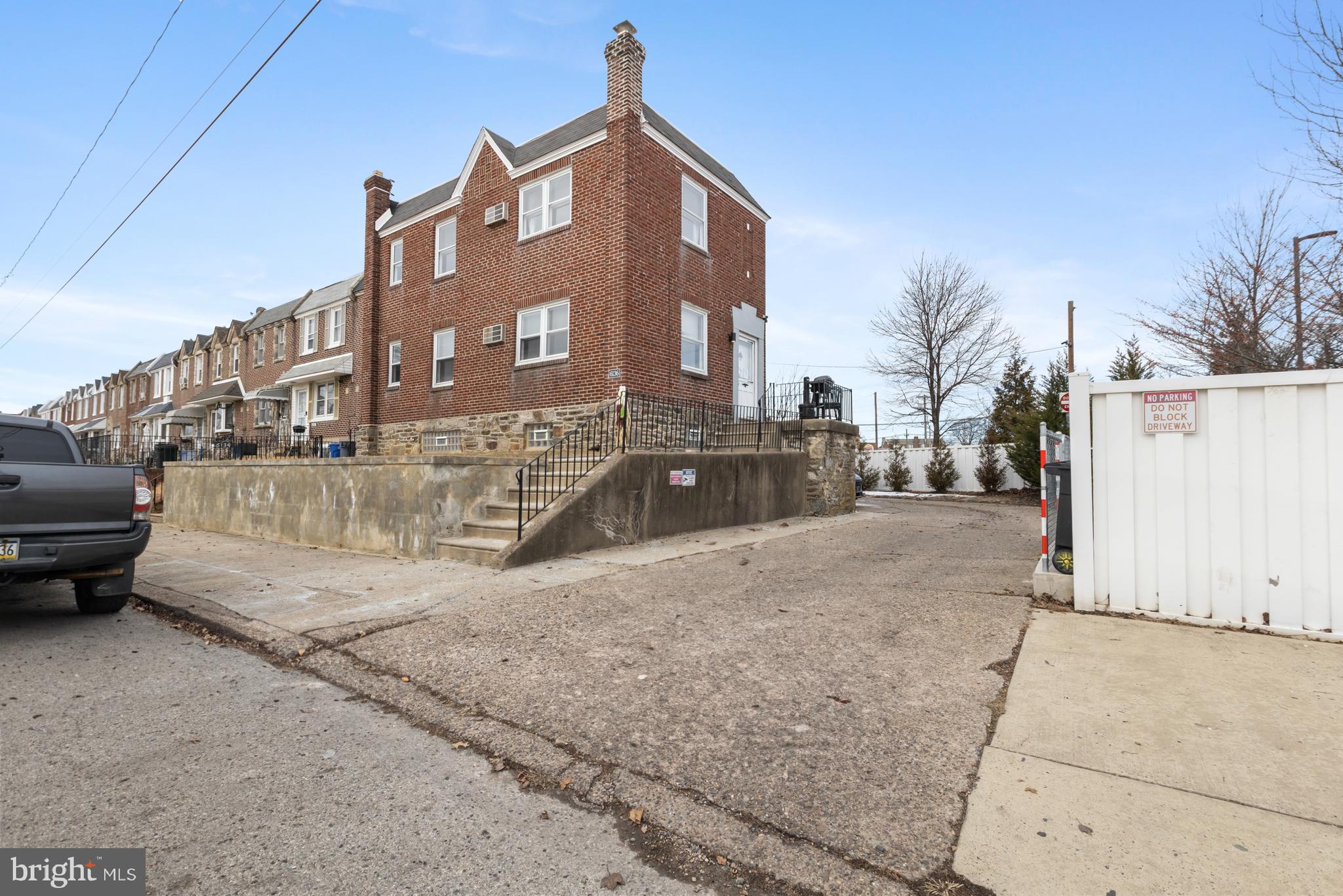 6136 Hawthorne Street Philadelphia, PA 19135 - Photo 2 of 38 a front view of a house with a yard