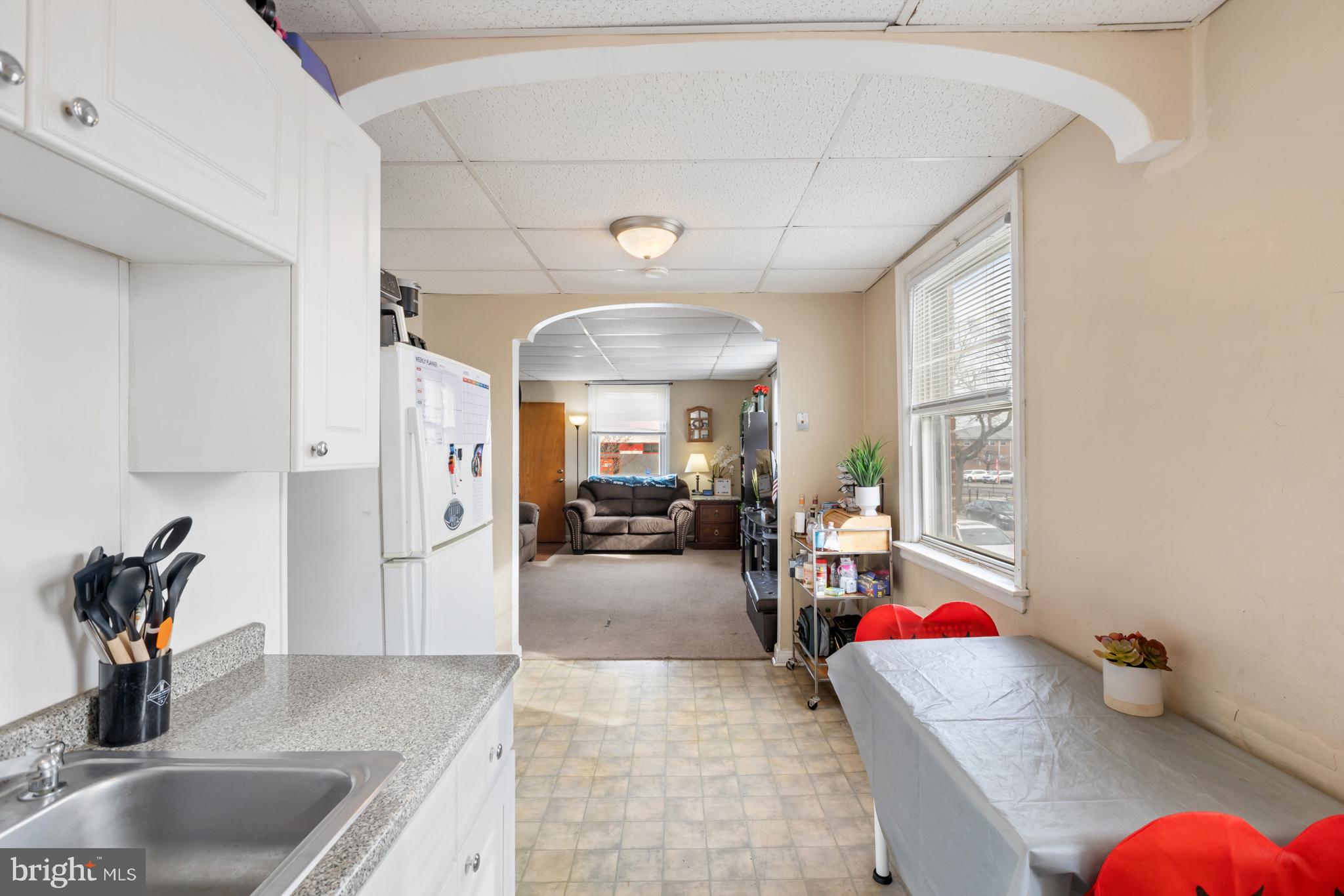 6136 Hawthorne Street Philadelphia, PA 19135 - Photo 10 of 38 a very nice looking room with a couch