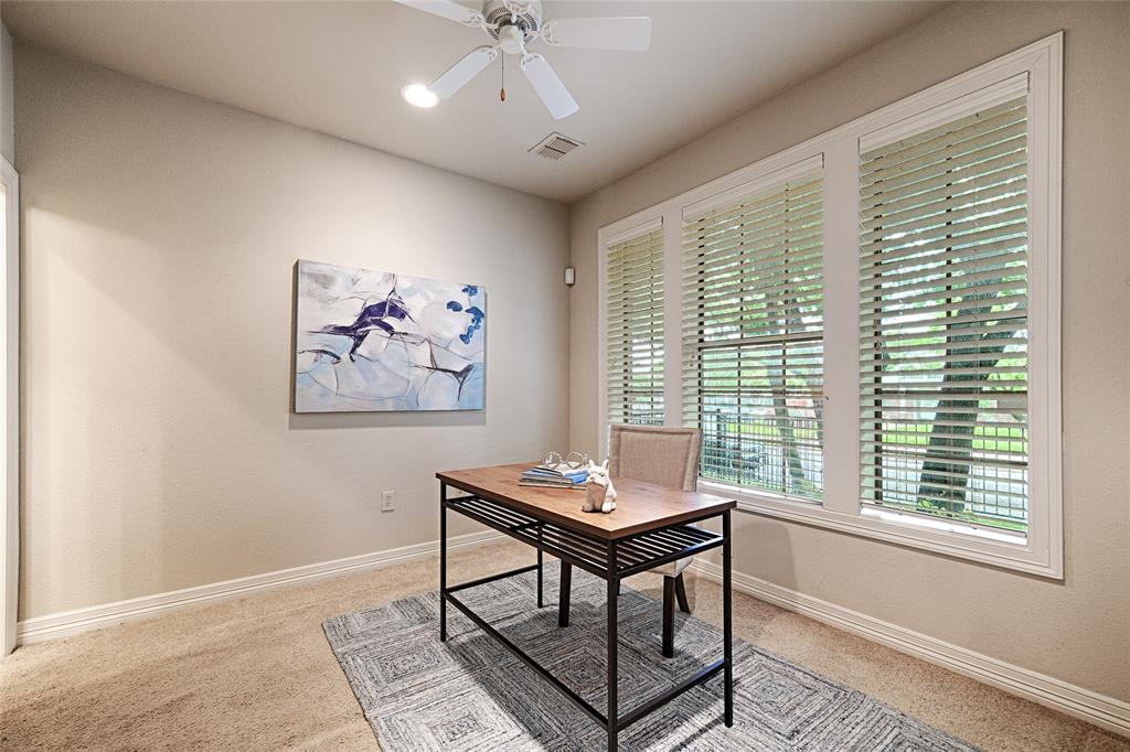 6269 Oram Street, Unit 10 Dallas, TX 75214 - Photo 3 of 25 a workspace with furniture and a window