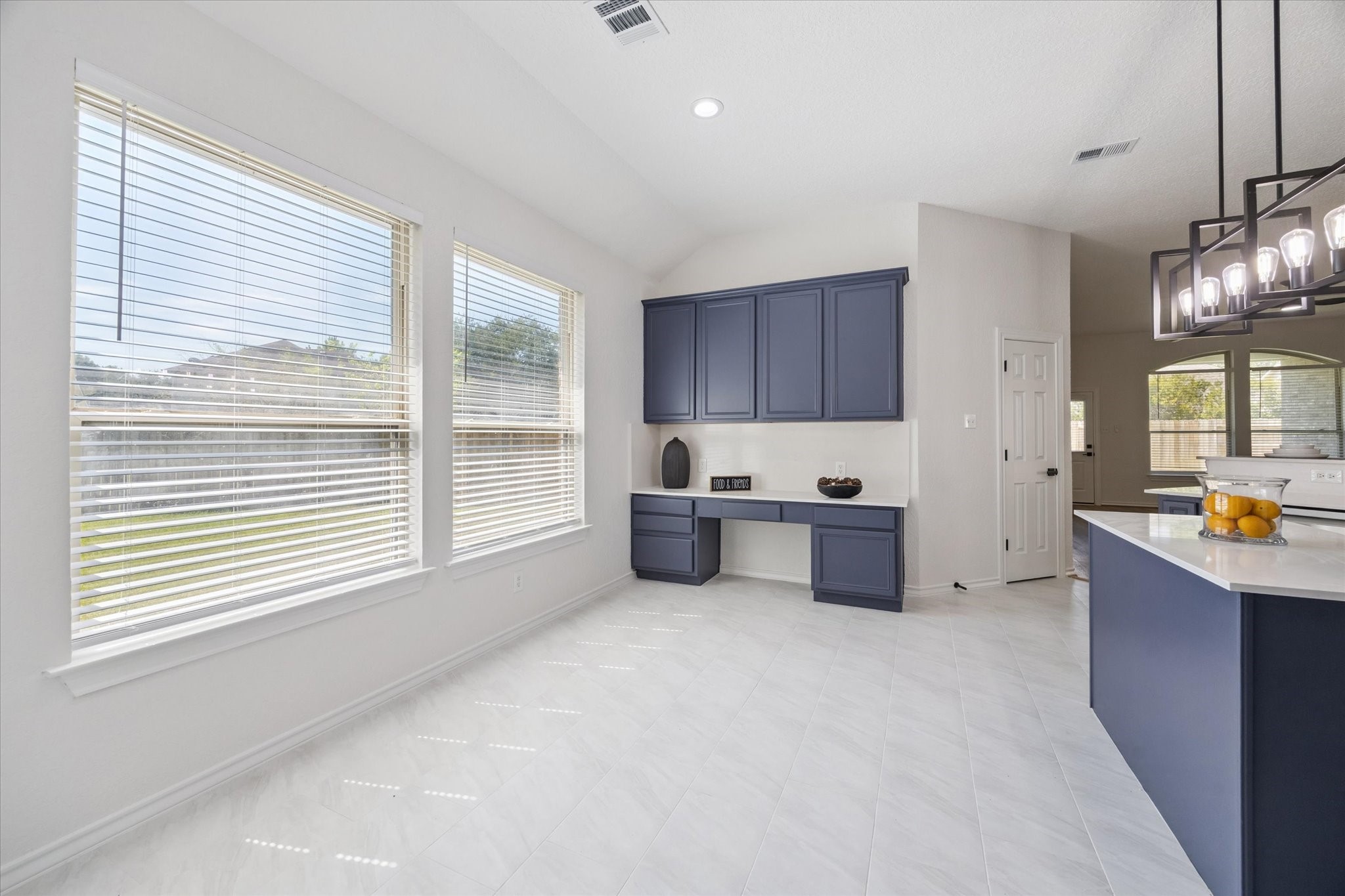 26110 Pointer Ridge Lane Katy, TX 77494 - Photo 11 of 25 a kitchen with stainless steel appliances a sink a window and cabinets