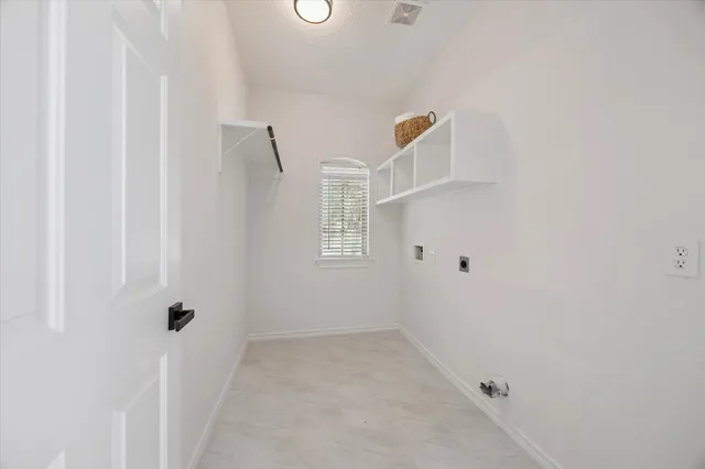 a view of a hallway with closet