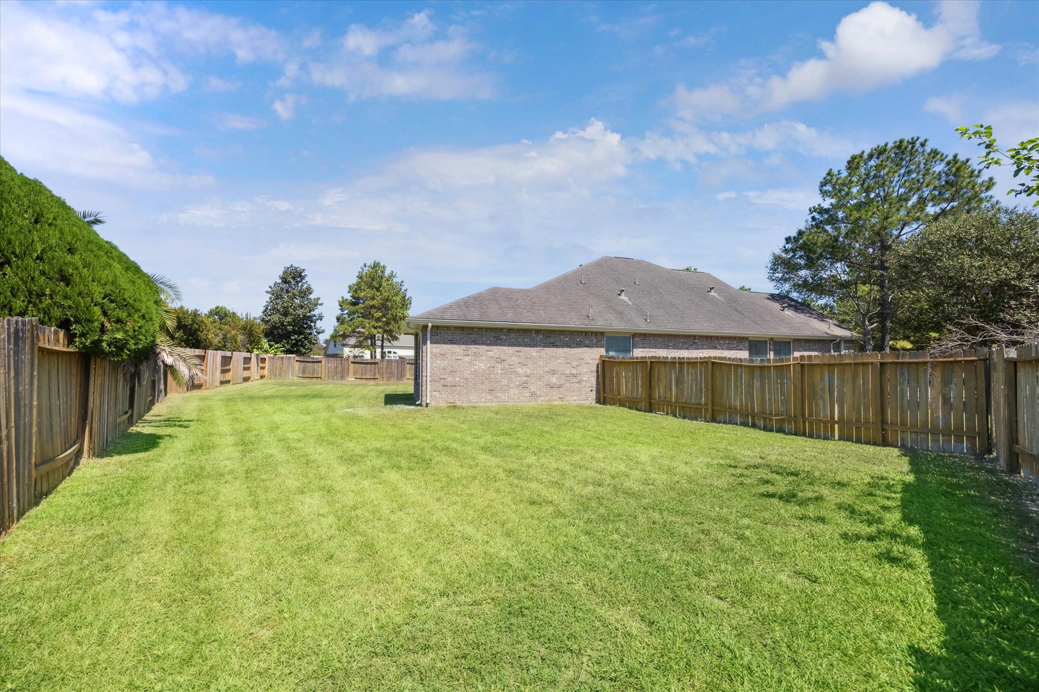 26110 Pointer Ridge Lane Katy, TX 77494 - Photo 25 of 25 a backyard of a house with lots of green space