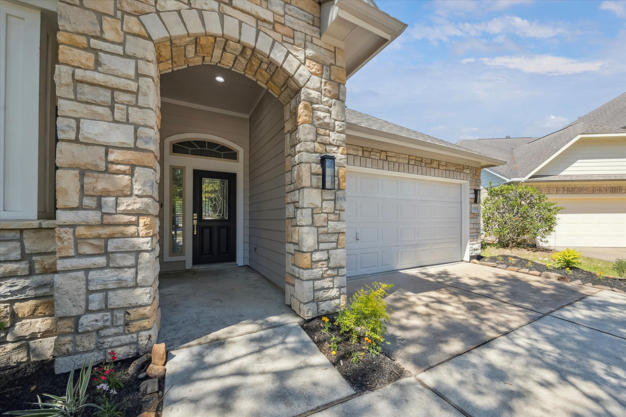26110 Pointer Ridge Lane Katy, TX 77494 - Photo 5 of 25 a view of front door of house with an outdoor space